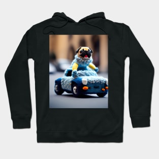 A knitted pug dog driving a woolly convertible car Hoodie